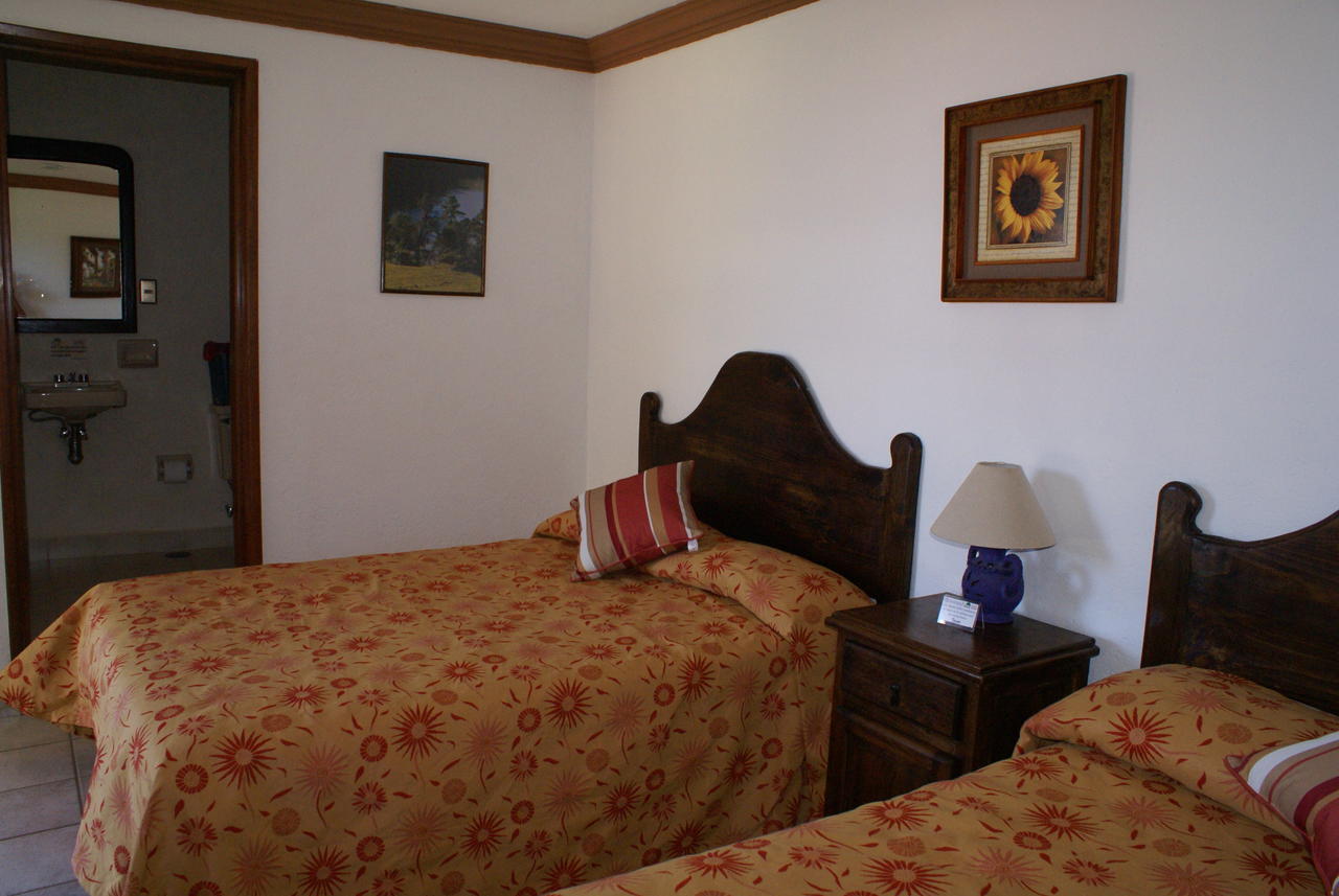 Hotel Los Sauces Villa Del Carbon Rom bilde